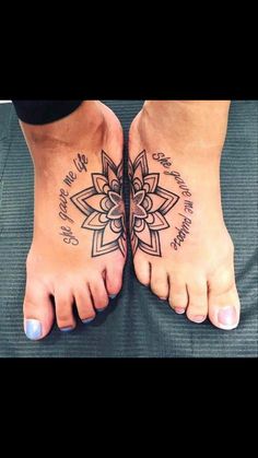 two feet with tattoos on them, one has a lotus and the other has a flower