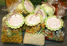 bags filled with food sitting on top of a table