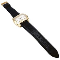 Men's Baume & Mercier 38mm x 42mm Hampton 18K Solid Yellow Gold Automatic Watch with Black Leather Band and Silver Dial. Pre-Owned SN# 355**** Dial: Silver. Gender: Men's. Model: Hampton. Condition: Excellent. Bracelet: Leather Band. Crystal: Sapphire Crystal. Brand: Baume & Mercier. Case Diameter: 38mm x 42mm. Bezel Material: 18K Yellow Gold. Movement: Manual-Winding (Mechanical). Case Material: 18K Solid Yellow Gold. Bracelet Material: Aftermarket Leather. Box: Aftermarket Mahogany Wooden Box. Rectangular Yellow Gold Watch Accessories For Formal Occasions, Formal Yellow Gold Diamond Watch With Rectangular Shape, Luxury Yellow Gold Jewelry And Watches For Formal Occasions, Timeless Yellow Gold Watch Bands For Business, Designer Formal Watches With Subdials, Luxury Yellow Gold Watches For Formal Occasions, Gold Watch Bands With Rectangular Dial For Formal Occasions, Luxury Yellow Gold Diamond Watch For Formal Occasions, Designer Yellow Gold Watch Accessories For Formal Occasions