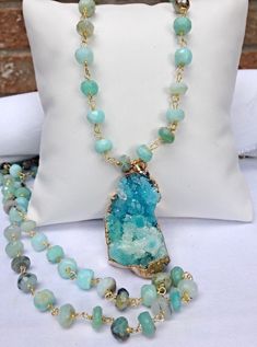 "Peruvian Blue Opal is a beautiful gemstone with shades ranging from a light minty turquoise to more of a sky blue and then off to a green/ turquoise blend. Every once in a while a somewhat grayish black will occur.  Each hand faceted rondelle stone is hand wired to the next using vermeil wire. All the metal findings are gold filled and I use a lobster claw clasp for the best security.  When ordering, keep in mind that a 36\" length gives you the most versatility. You can layer shorter pieces with it and double it up for major impact at your neckline. The Druzy in the main photograph has sold.  The fourth photograph gives you an idea of my Aqua Druzy collection. To see my other gemstone chains and more of my collection, please visit my shop at: ❤️ Cut Chain Is Not Returnable❤️ www.ShalomJe Star Earrings Dangle, Blue Opal Jewelry, Aqua Gemstone, Rosary Chain Necklace, Peruvian Blue Opal, Crown Necklace, Peruvian Opal, Necklace Layering, Rosary Chain