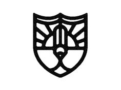 a black and white image of a shield