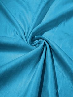 a close up view of a blue fabric