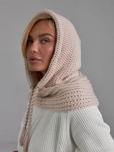 Beige Wool Balaclava Hat, Women Knit Balaclava, Knitted Women Hood, Winter Hat, Knit Hood, Neck Warmer, Trending Now, Outdoors Gift The trendy version of the headdress is a snood hood made of cozy warm wool blend yarn. The model of comfortable volume is combined with a collar that covers the base of the neck and replaces a scarf. The hood has a drawstring with a twisted cord to adjust the fit along the edge. Leave this scarf on after you take off your jacket, it will become a stylish addition to a pullover or sweater. A super soft and cozy hooded scarf. Product details: 70% acrylic, 20 % mohair, 10 %wool Width - 12 in Length - 20 in Winter Knit Bonnet, Winter Knit Bonnet One Size, Cozy Knitted Beige Bonnet, Winter Knit One-size Bonnet, One Size Knit Crochet Hat For Winter, Cozy Beige Knit Crochet Hat, Cozy Beige Crochet Knit Hat, Cozy Knitted Bonnet One Size, Cozy Knitted One-size Bonnet