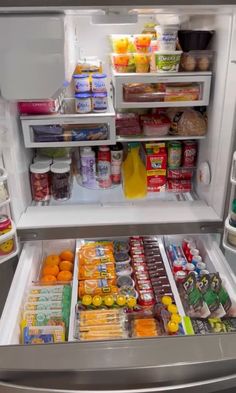 an open refrigerator filled with lots of food