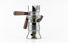 an espresso coffee maker with a wooden handle on it's top and bottom