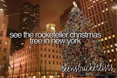 the rockefeller christmas tree in new york is lit up at night with words above it