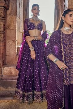 Purple attached cancan scallop hem lehenga with all over florin bahar embroidery using dabka, pearl, gota and zari embellishments. Paired with a strap sleeves matching embroidered padded blouse and an embroidered scallop border handblock printed dupatta. - Aza Fashions Purple Palazzo Set With Pallu For Wedding, Purple Wedding Palazzo Set With Pallu, Wedding Navratri Purple Palazzo Set, Bollywood Wedding Palazzo Set With Motifs, Wedding Dresses With Motifs, Purple Sharara With Motifs For Wedding, Purple Wedding Sharara With Motifs, Festive Wedding Palazzo Set With Motifs, Fitted Sharara With Motifs For Reception