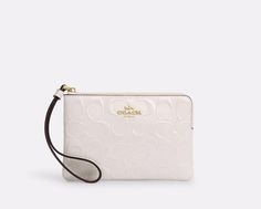 COACH CT992 Corner Zip Wristlet Wallet In Signature Patent & Smooth Leather GOLD/CHALK (Off White, Cream) MSRP $88 Product Details: Signature patent and smooth leather Two credit card slots Zip-top closure 6.25" (L) x 4" (H) x .5" (W) Wrist strap attached Style No. CT992 This Wristlet/Wallet does not come with a Dust Bag. ALL ITEMS ARE GUARANTEED 100% AUTHENTIC and BRAND NEW! Your Beautiful New Coach Wallet will be carefully and neatly wrapped shipped within one day of Purchase! Please remember due to variations in camera and phone/computer screen settings the colors may not be exactly as they appear on your screen. Message me with any questions you may have. I'll be happy to help.  Thank you for shopping with us and please check out our other listings! Wishlist 2024, Coach Wallet, Wristlet Wallet, Christmas 2024, Computer Screen, Christmas Wishlist, Zip Top, Wrist Strap, White Cream