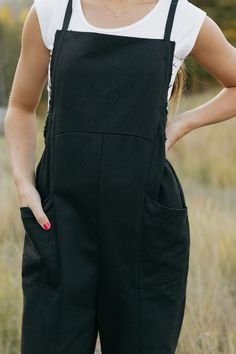 Introducing our Callum Overalls in black! Featuring a relaxed fit, adjustable straps, and front pockets, these overalls are both stylish and functional. The raw hem detail along the sides and back add an edgy touch, while the cinched sides offer even more detail. Perfect for your everyday look! *Relaxed fit* Material Content: 60% Cotton // 40% Polyester Material Pattern: Solid Kirsten is 5'4" wearing a small Model measurements: Kirsten: Height: 5'4" // Chest: 32" // Waist: 24" // Hips: 27" Amand Body Sock, Clogs Heels, Black Overalls, Heel Accessories, Platform Slippers, Striped Socks, Mom Dress, Light Denim, Short Jumpsuit