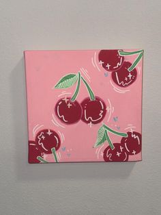 a painting of cherries on a pink background