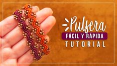 a hand holding two beaded bracelets with the words flusera faci y rapid