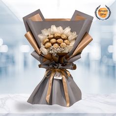 a bouquet of chocolates wrapped in brown paper