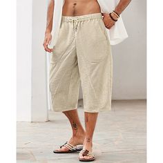 Category:WE-Pants; Season:Summer; Fabric:25% Linen,75% Cotton; Gender:Men's; Style:Hawaiian,Boho; Occasion:Beach,Holiday,Vacation; Fit Type:Regular Fit; Function:Comfort,Breathable; Waistline:Mid Waist; Pattern:Plain; Design:Elastic Waist,Drawstring,Pocket; Pants Type:Summer Shorts,Linen Shorts,Beach Shorts; Fly Type:Elasticity,Drawstring; Front page:FF; Listing Date:04/07/2024; Production mode:External procurement; Hips:; Length:; Waist:; Pants Length:Calf-Length Summer Khaki Bottoms With Built-in Shorts, Khaki Bottoms With Built-in Shorts For Summer, Non-stretch Beach Shorts With Built-in Shorts, Casual Khaki Beach Bottoms, Casual Beach Bottoms For Warm Weather, Bottoms With Built-in Shorts For Vacation Leisure, Casual Khaki Bottoms For Beach Season, Leisure Bottoms With Pockets For Vacation, Non-stretch Casual Beach Shorts