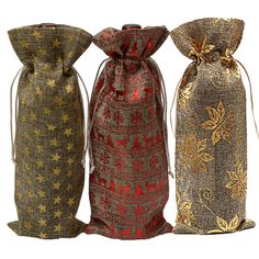 three bags with gold stars on them sitting next to each other