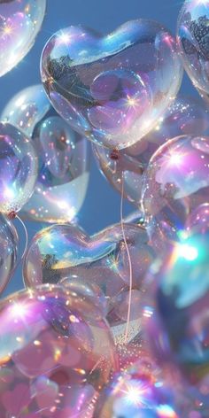 soap bubbles floating in the air on a blue sky background with white and pink colors