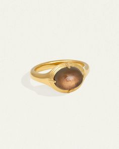 The Esse Ring is an 18k gold vermeil seal ring with oval cabochon dome. Shop signet ring with smoky quartz symbolising connection to the earth. Modern Gold Signet Ring With Cabochon, Timeless Signet Ring With Oval Cabochon Gemstone, Luxury Gold Oval Cabochon Moonstone Ring, Luxury Gold Moonstone Ring Oval Cabochon, Luxury Gold Moonstone Ring With Oval Cabochon, Classic Gold Moonstone Ring With Oval Cabochon, Timeless Gold Dome Ring With Cabochon, Luxury Gold Oval Moonstone Ring, Timeless Gold Oval Moonstone Ring