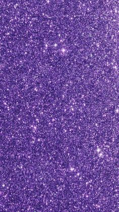 purple glitter textured background with lots of small sparkles on the bottom and sides