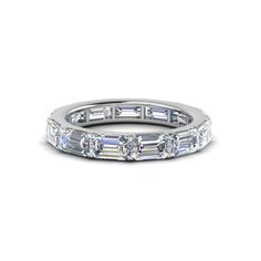 a white gold wedding band with baguetts