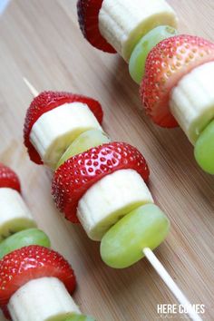 fruit skewers with strawberries, apples and bananas