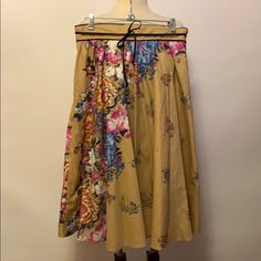 Vintage Nos Nwt Tan Floral Skirt With Attached Black Belt. Zips And Buttons Up The Side. Tag Reads Size 15/16. Waist: 15” Across The Front, Hips: Free, Length: 29”. Spring Beige Floral Print Skirt, Spring Brown Relaxed Maxi Skirt, Spring Flowy Brown Skirt, Beige Floral Print Skirt For Day Out, Beige Floral Print Midi Skirt, Spring Brown Cotton Maxi Skirt, Brown Cotton Maxi Skirt For Spring, Cotton Brown Maxi Skirt For Spring, Spring Brown Fitted Maxi Skirt