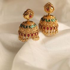 Description This timeless jhumki earring is perfectly crafted with polki stones on a gold-plated setting and finished with precious stones. An elegant wardrobe essential, these jhumki earrings will be your favorite. Style with the traditional accessories from the Vihara family for a grand look. This is the perfect choice for festival events and weddings. Product Information Metal: 925 Silver with 1.0 microns Antique Gold Plating Length: 4 cm Stones: Semi precious stones Findings: Screw back type 22k Gold Chandbali Jhumkas For Festive Occasions, Temple Jewelry Kundan Jhumkas With Matching Earrings, Gold Plated Temple Jewelry Jhumkas, Gold Plated Temple Jewelry Jhumkas With Tilla, Gold Plated Tilla Jhumkas In Temple Jewelry Style, Gold Plated Tilla Jhumkas Temple Jewelry, 22k Gold Chandbali Jhumkas With Cutdana, 22k Gold Chandbali Jhumkas With Tilla, Festival Gold Plated Cutdana Jhumkas