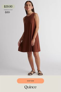 This mini swing dress is as flattering as it is flirty. Made with our soft Tencel™ fabric, the relaxed fit and flared hem creates a silhouette that flatters every form. Tencel™ lyocell is a biodegradable fabric made from cellulose found in wood pulp. It is softer, more breathable, and uses 10-20 times less water in production compared to cotton.  | Quince | Women's Tencel Jersey Mini Swing Dress in Brown, Size XS Casual Fit And Flare A-line Mini Dress, Casual A-line Fit And Flare Mini Dress, Casual Brown A-line Mini Dress, Casual A-line Mini Dress With Relaxed Fit, Quince, Swing Dress, Perfect Fit, Shop Now, Relaxed Fit