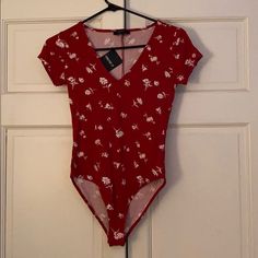 Forever21 Nwt Dark Red Floral Ribbed Body Suit Size Small. Spring Red V-neck Bodysuit, Red V-neck Bodysuit For Spring, Red Fitted V-neck Bodysuit, Fitted V-neck Floral Print Bodysuit, Fitted Red V-neck Bodysuit, Casual Forever 21 Bodysuit For Summer, Fitted Red Forever 21 Top, Red Casual Bodysuit For Spring, Casual Red Bodysuit For Spring