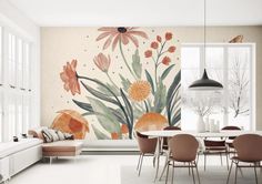 a dining room with a large mural on the wall