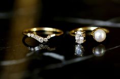 three different types of rings on a table