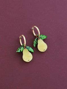 We've brought back and updated our much loved pear hoops - a W&M classic! Romantic pear charms made with acrylic, wood and hand-inked details. Purchase without hoops and add the charms onto a pair you already have, or mix and match for the perfect fruit combo!  Photographed on 19mm 14k go... Carrot Necklace, Pear Earrings, Wardrobe Goals, Hoop Charms, Gold Filled Hoops, Mini Bows, Sterling Silver Hoops, Wood Jewellery, Pearl Studs