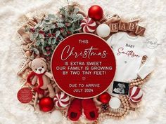 a baby's first christmas is extra sweet, our family is growing by two tiny feet