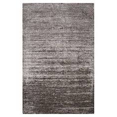 an area rug with grey and black stripes