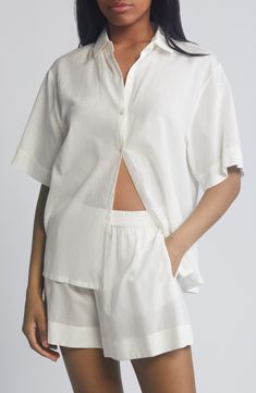 Crisp PJs with a collared short-sleeve shirt and elastic-waist shorts are ones you'll want to wear all weekend long. 26 1/2" length top; 2 1/2" inseam; 31" leg opening; 12 1/2" front rise; 16" back rise (size Medium) Top has front button closure; notched collar; short sleeves; chest patch pocket Shorts have elastic waist 55% cotton, 45% viscose Machine wash, tumble dry Imported Cotton Sleepwear For Everyday Summer Use, Classic Summer Sleepwear For Loungewear, Classic Summer Sleepwear, Classic Cotton Summer Sleepwear, Classic Summer Sleepwear In Relaxed Fit, White Collared Cotton Sleepwear, White Short-length Tops For Daywear, White Short Length Tops For Daywear, Classic White Shorts For Daywear