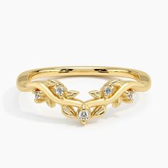 a gold ring with leaves and diamonds