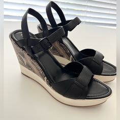 Never Worn (No Box) In Excellent Condition, Light Dirt On The Heels And Little Peeling On Strap. See Video & Pictures For Flaws Size 10.5 Questions? Leave A Comment Below! Black Leather Wedge Sandals, Black Leather Wedge Heel Sandals, Leather Wedge Heels For Vacation, Black Leather Wedge Sandals For Vacation, Black Leather Heels For Vacation, Casual Wedge Sandals With 4-inch Heel, Leather Wedge Sandals With 4-inch Heel For Spring, Casual Leather Wedge Sandals With 4-inch Heel, Black Wedge Sandals For Evening, Medium Width