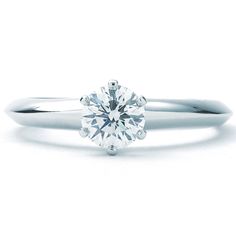 Product Description This listing is for a previously-owned Tiffany & Co. Solitaire Collection ring. The ring is a size 4.75 (US), made of platinum, and weighs 2.60 DWT (approx. 4.04 grams). It also has one round I-color, VS2-clarity diamond weighing 0.53 CTTW. Designer Tiffany & Co. Weight 2.60 DWT Collection Solitaire Ring Size 4.75 Condition Pre-owned Ref. Number R448570 Metal Platinum Packaging and Additional Features This Tiffany & Co. Solitaire  ring comes with  an original box and an original appraisal. * All sizes are approximate. New York Jewelers © 2019 All pictures are of the actual item. Please Note We ship all packages signature required. We do not ship to PO Boxes. Payment must be completed within 36 hours of sale, otherwise the item is relisted and a case is opened. About New Timeless Round Diamond Ring With Vs Clarity, Platinum Diamond Ring With Vs Clarity, Classic Lab-grown Diamond Ring With Vs Clarity, Timeless 14k White Gold Rings With Vs Clarity, Classic Wedding Ring With Vs Clarity, Classic Round Wedding Ring With Vs Clarity, Diamond White Rings With Vs Clarity And Round Cut, Formal Platinum Rings With Classic Cut, Platinum Rings For Formal Occasions With Classic Cut