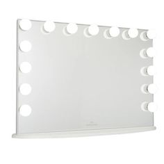 a white vanity mirror with lights on it