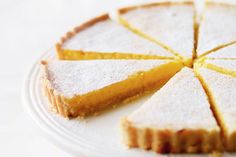 slices of lemon tart on a white plate