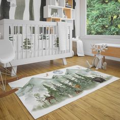 a baby's room is decorated in white and green colors with trees on the wall