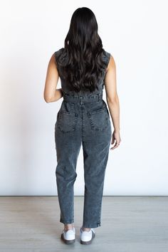 Elevate your style with our Wishful Thinking Black Washed Denim Jumpsuit. Versatile and chic, layer with a long sleeve or mesh top for warmth or dress up with heels for an elegant touch. Complete the look with tennis shoes for a casual yet sophisticated vibe. There is a zipper going down the front and removable belt. We recommend getting your true size. Ally is 5'5 and is wearing a size small Machine Wash Cold Tumble Dry Low 97% Cotton & 3% Spandex Chic Dark Wash Overall Jumpsuits And Rompers, Chic Dark Wash Jumpsuits And Rompers With Pockets, Chic Dark Wash Denim Overall Jumpsuit, Chic Dark Wash Overall Jumpsuit, Chic Dark Wash Denim Jumpsuit, Chic Non-stretch Cotton Denim Jumpsuit, Chic Dark Wash Denim Jumpsuit With Relaxed Fit, Chic Dark Wash Relaxed Fit Denim Jumpsuit, Trendy Black Sleeveless Denim Jumpsuit