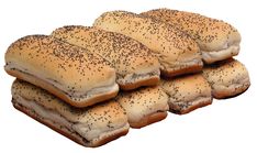 several sesame seed bagels stacked on top of each other