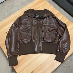 Never Worn. Brown. Bronze Zippers. 4 Front Pockets. 3x Forever 21 Hooded Fall Outerwear, Forever 21 Hooded Outerwear For Fall, Hooded Forever 21 Outerwear For Fall, Forever 21 Fall Streetwear Outerwear, Forever 21 Jacket, Bomber Jackets, Forever 21, Bomber Jacket, Jackets & Coats