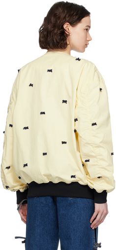 Cotton poplin bomber jacket. Bow appliqués throughout. · Crewneck · Zip closure · Rib knit hem and cuffs · Dropped shoulders · Full mesh lining Supplier color: Ivory Yellow Ribbon, Cotton Poplin, Drop Shoulder, Top Brands, Rib Knit, Bomber Jacket, Crew Neck, Yellow, Luxury Fashion