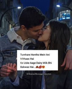 a man and woman kissing in front of a sign that reads tumhare honho mein inni