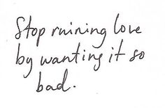 a handwritten quote on white paper that says stop running love by wanting it's bad