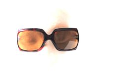 "Classy vintage 90s, dark brown tortoise, rectangular, curved shape with a dark brown lenses sunglasses. Made in France. Simple and stylish. Gently used condition. Clean and strong. No discoloration, no brocked parts. There only a tiny scratch at the frame neer by right lense. But it's not visible and don't effected a value. Measures: Length fron the arm to the arm at the middle: Length of the bridge: 0,5\" Size of the lenses: 2,0\" x 1,1\"x 1,75\" Length of the arms: 5,5\" Thank you for stoppin Retro Brown Sunglasses For Formal Occasion, Brown Square Sunglasses With Tinted Lenses, Brown Retro Sunglasses For Formal Occasions, Retro Brown Formal Sunglasses, Brown Retro Formal Sunglasses, Vintage Square Sunglasses With Tinted Lenses, Vintage Tortoiseshell Rectangular Sunglasses, Vintage Brown Rectangular Sunglasses, Rainy Winter