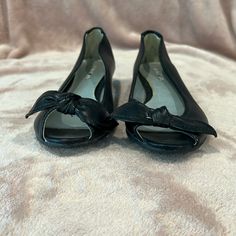 Black Kitten Heel With Bow. Brand New. Size 7.5. Black Synthetic Flats For Spring, Black Flats With Round Toe For Party, Black Round Toe Party Flats, Black Party Flats With Round Toe, Black Closed Toe Party Flats, Black Flats For Spring Party, Elegant Black Synthetic Flats, Black Low Heel Flats For Party, Black Synthetic Flats For Party