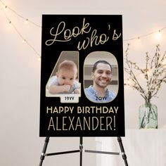 a birthday sign with an image of a man and a baby