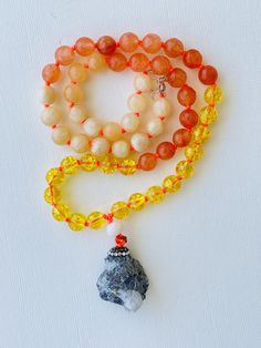 I am motivated to pursue my true purpose. I am comfortable with my power. I am ambitious and capable of whatever I desire. My solar plexus chakra is balanced. This purchase includes: Gemstone Mala, baggie, box, card including using your mala, intention setting and properties. GEMSTONES Calcite: Like an energetic vitamin, Calcite helps to keep your energy at its highest potential by removing energetic blocks and clearing negativity. It raises your vibration and uplifts your spirit, making it an e Amber Crystal Necklace For Meditation With Natural Stones, Handmade Amber Crystal Necklace For Meditation, Natural Stones Pendant Crystal Necklace For Meditation, Natural Stone Pendant Crystal Necklace For Meditation, Spiritual Amber Beaded Necklaces With Natural Stones, Spiritual Amber Necklace For Healing, Crystal Pendant Necklace With Natural Stones For Meditation, Spiritual Amber Beaded Necklace With Natural Stones, Bohemian Amber Crystal Necklace For Meditation