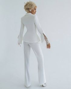 Pants suit "Louise" A classic business suit with delicate details. Reveal your femininity!Jacket with seductive neckline, trimmed with weightless lace. Original asymmetric cut of the bottom of the jacket. Sleeves decorated with thin French lace are particularly noteworthy. The correct cut of the straight pants visually extends the silhouette. Under white or black pump shoes this suit looks stylish and sophisticated. DETAILS: Quality tailoring: PREMIUM Basic fabric: heavy Turkish suit fabric. Com Women Prom Suit, Peplum Pants, Dressy Pant Suits, Bridal Pantsuit, White Pantsuit, Wedding Pantsuit, Elegant Suit, High Waisted Flare Pants, Tuxedo Women